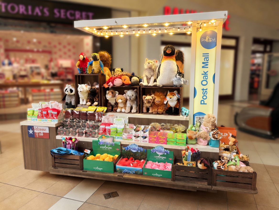 Cuddle Candy Co kiosk at Post Oak Mall, right in front of Rally House